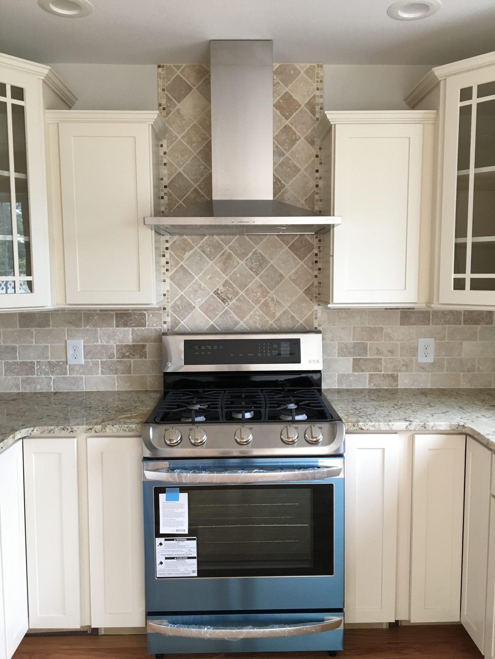 New Hampshire kitchen remodel with center island and pendant lighting