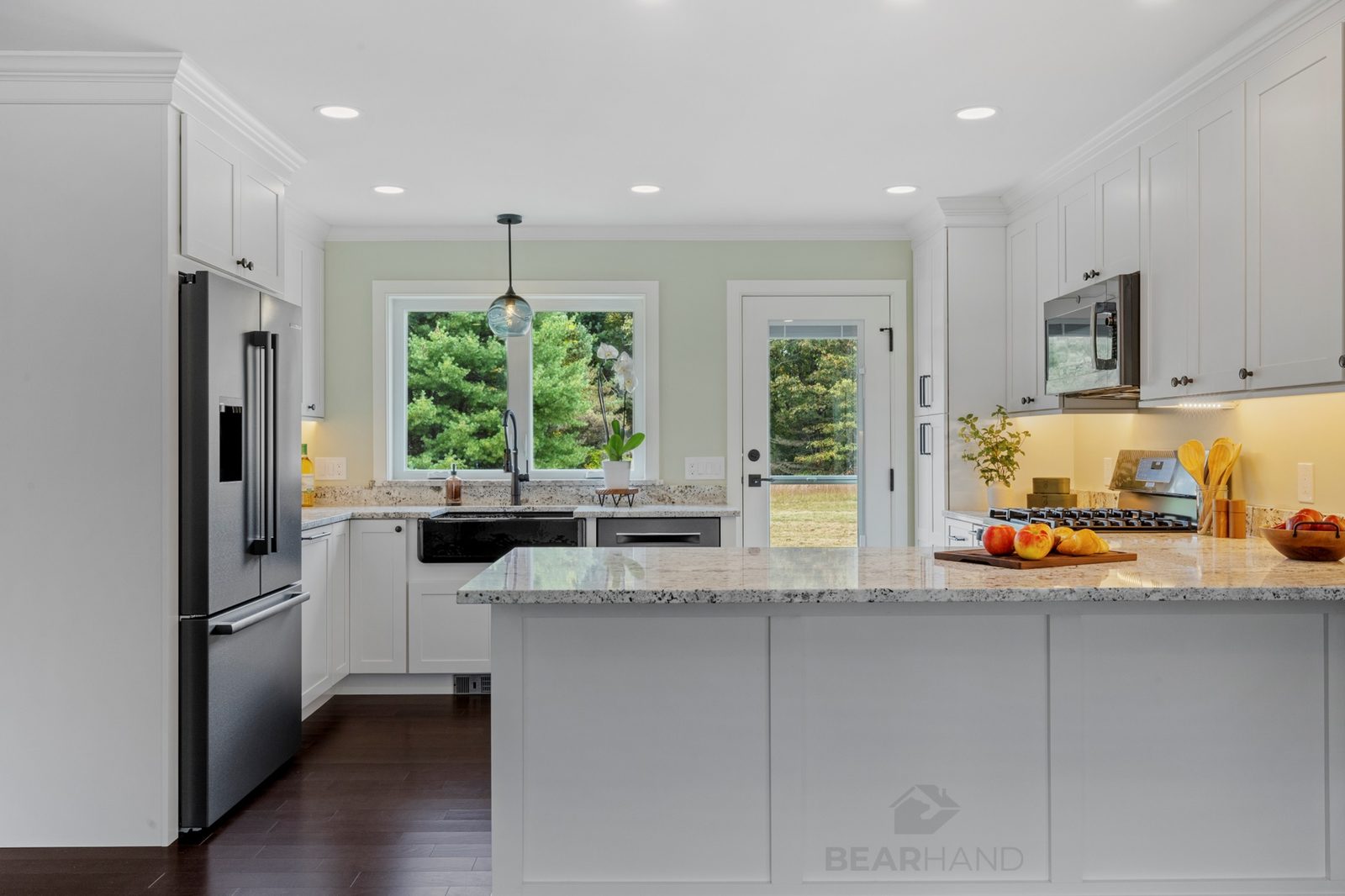 Transitional white shaker kitchen remodel in Southern NH by BearHand Construction
