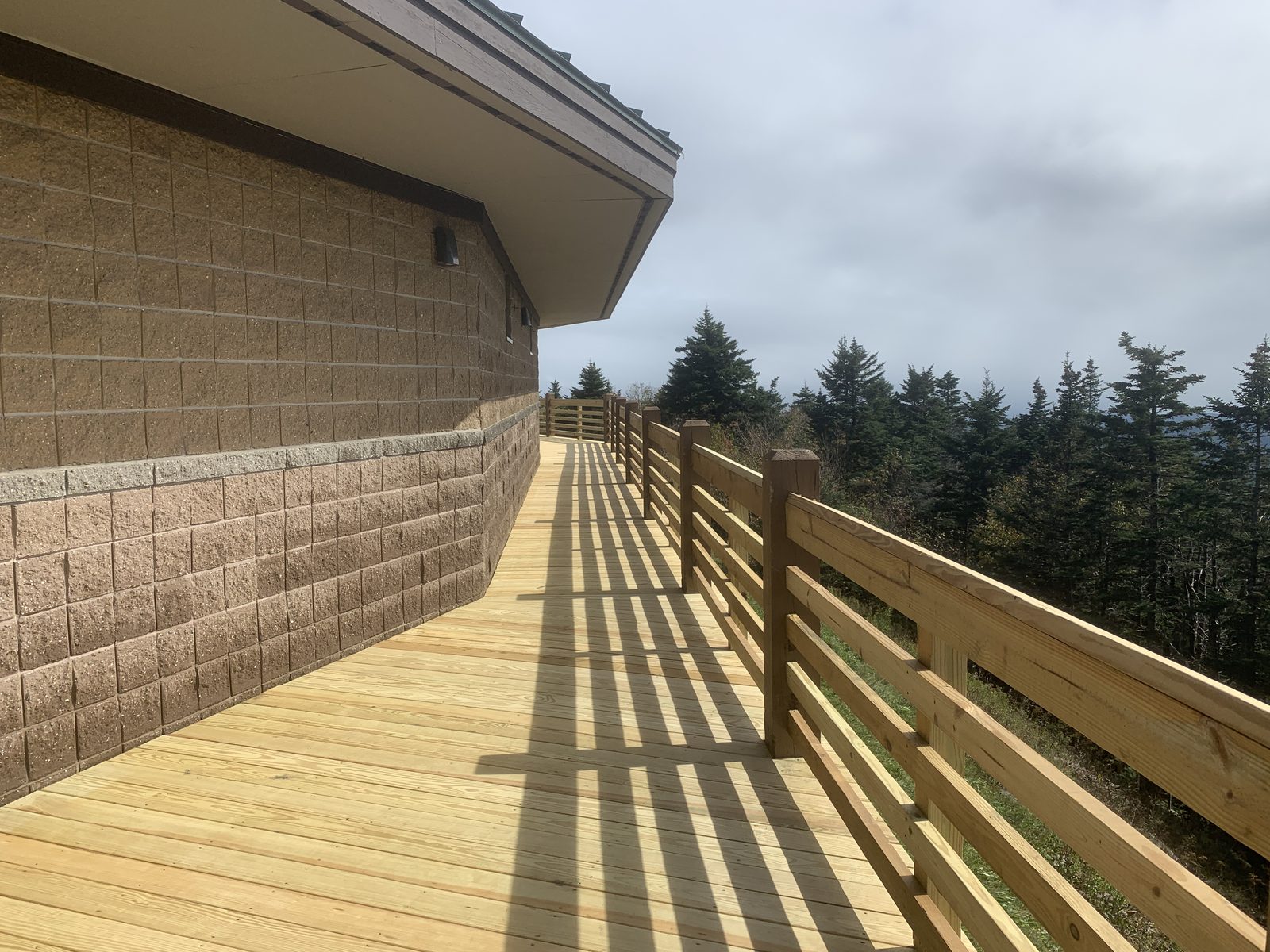 Completed exterior and deck project by BearHand Construction, NH