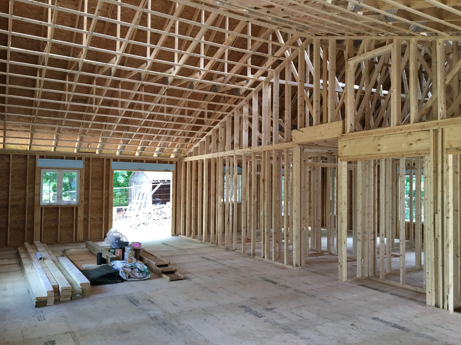 Home addition with matching siding and roofline in Southern NH by BearHand Construction