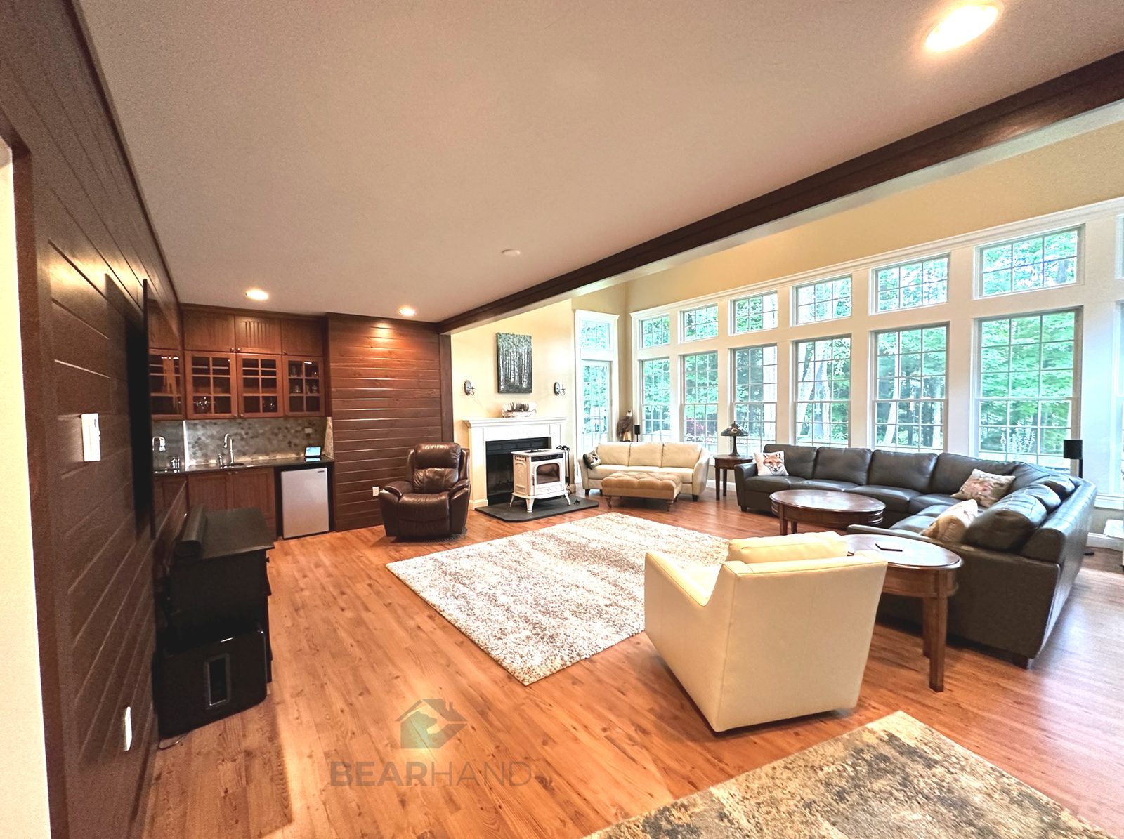 Sunroom and living-space addition by BearHand Construction, Southern NH