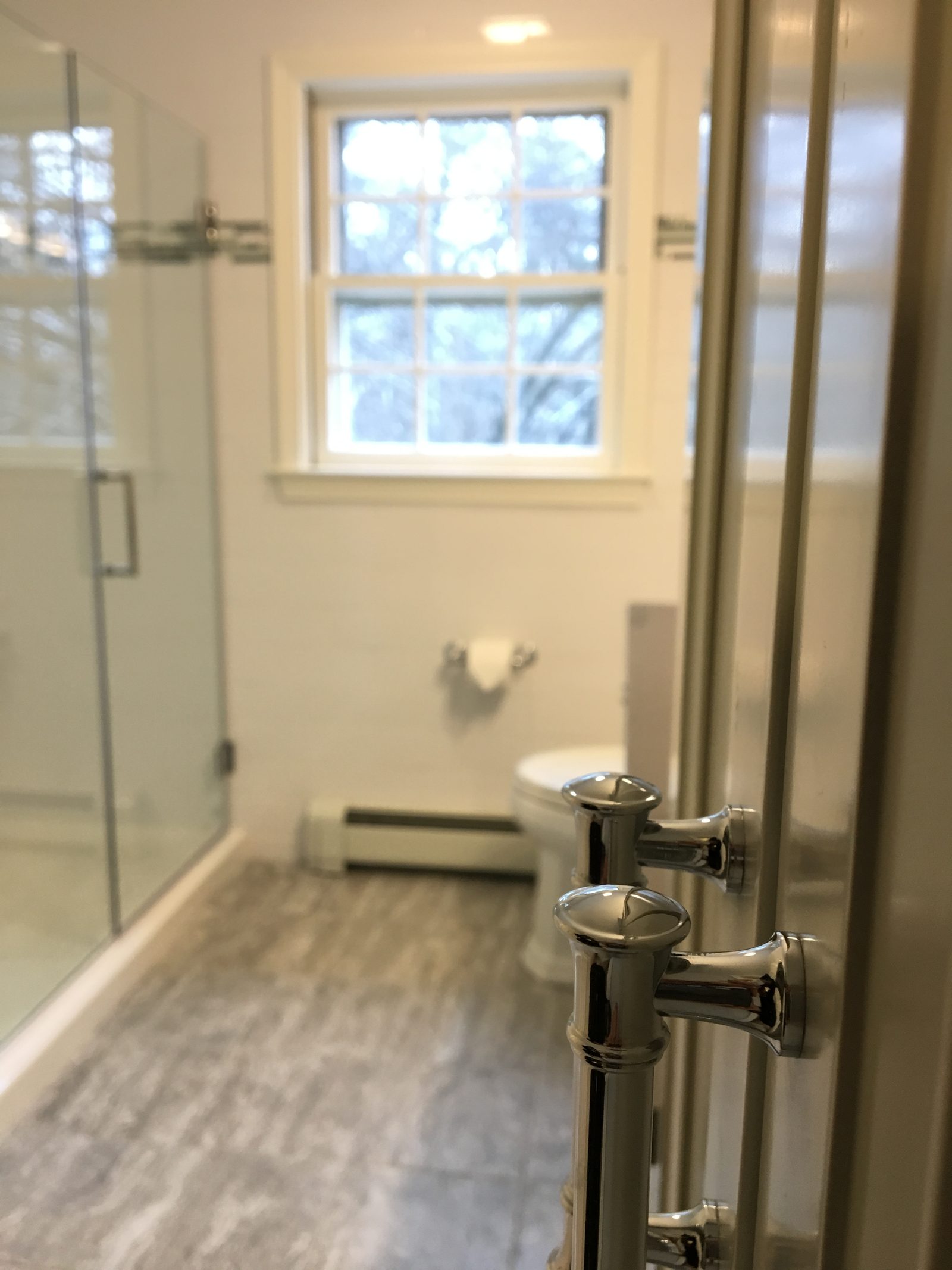 Grey and blue spa bathroom renovation in New Hampshire