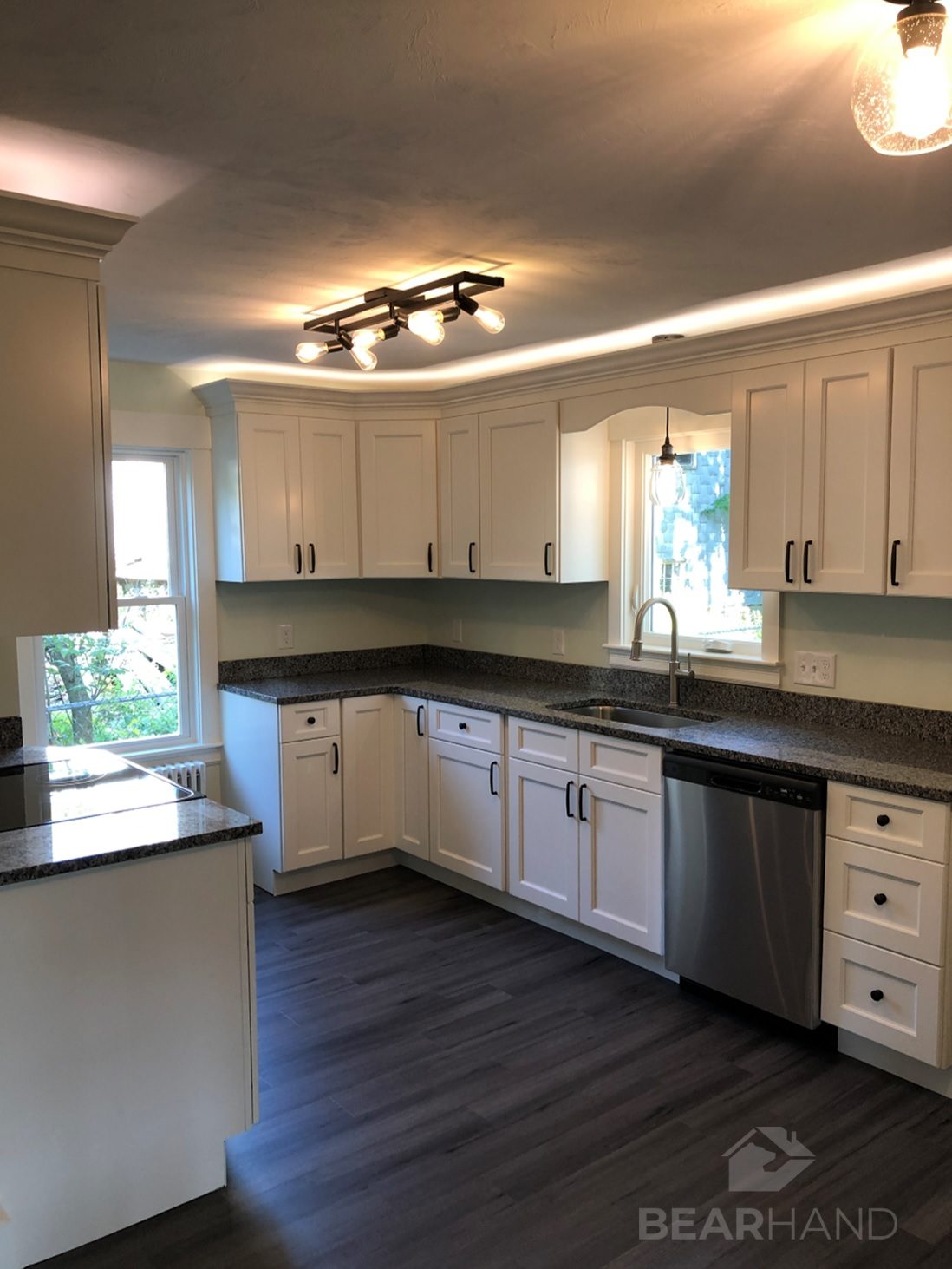 Custom kitchen cabinetry and countertop detail by BearHand Construction